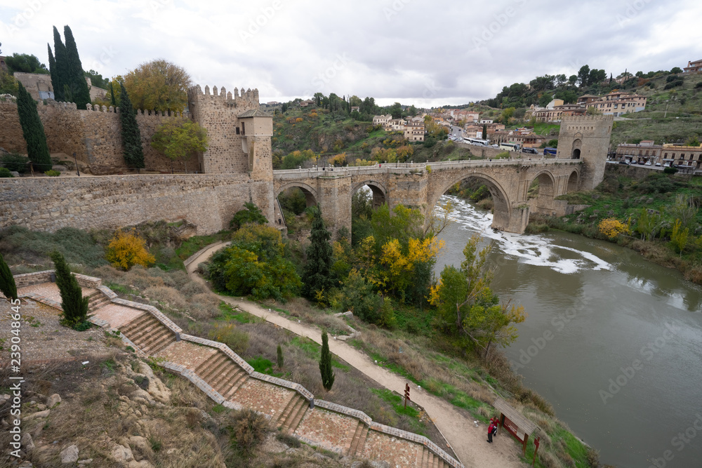 Fototapeta premium The Puente de San Martin (St Martin's Bridge), a medieval bridge across the river Tagus in Toledo, Spain. Constructed in the late 14th century. 