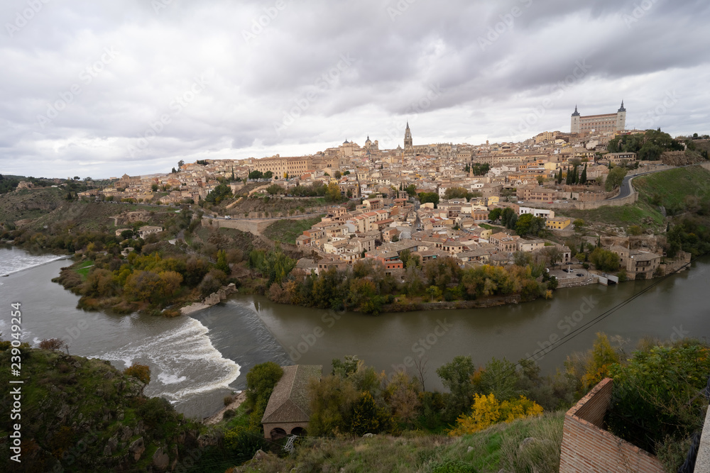 Skyline of old city of Toledo, Castile-La Mancha, Spain. View from the Ermita del Valle (Hermitage of Virgen del Valle) on the opposite bank of the river Tagus.