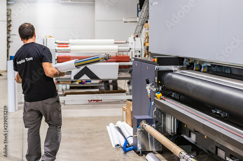 Professional  printing facility, big vinyl rolls, ready for large printer supply. Glossy, matte, ecological materials, mostly used for commercial billboards, urban advertising, and oversized projects.
