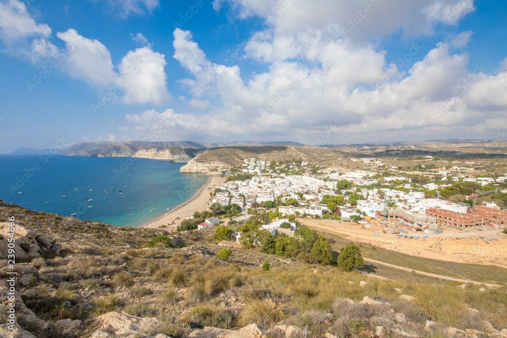 Agua Amarga village, from top of mountain, in Gata Cape Natural Park (Cabo de Gata in Spanish), wild and beautiful famous destination, in Almeria (Andalusia, Spain, Europe)