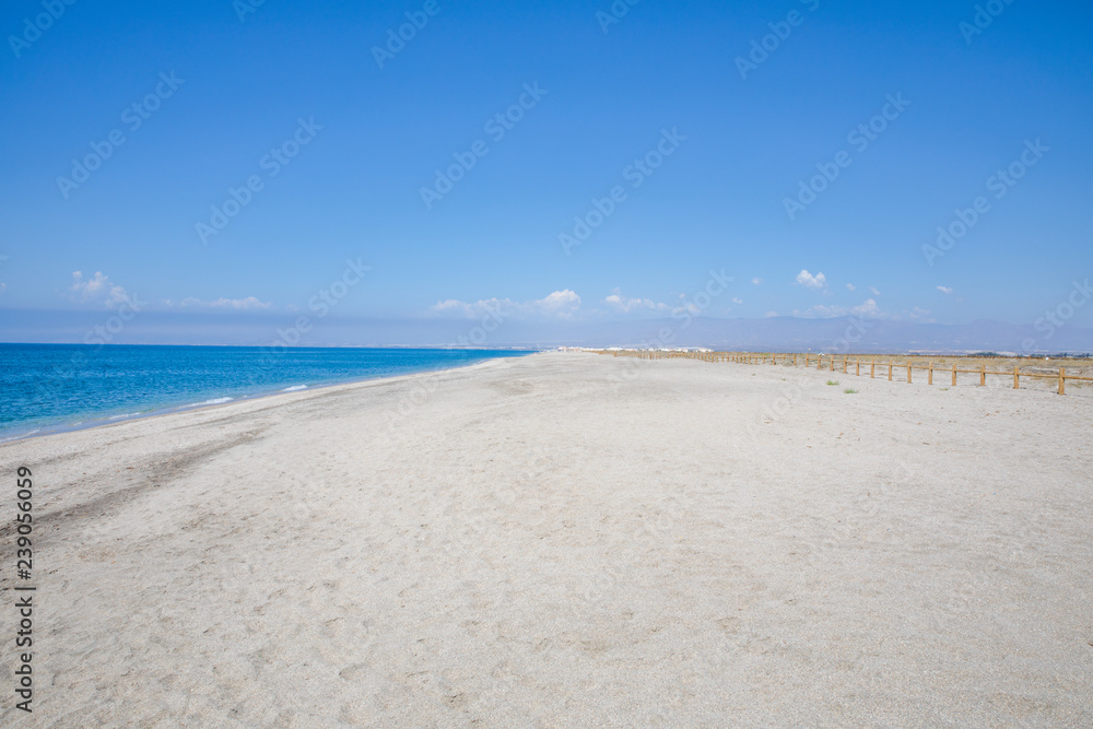 seashore of sandy long beach of Cabo de Gata, wild and beautiful famous destination, in Almeria (Nijar, Andalusia, Spain, Europe)