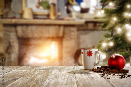 Table background and christmas mug on desk 