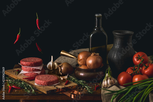 Fototapeta Naklejka Na Ścianę i Meble -  Raw beef burger, traditional barbecue, still life with vegetables and meat