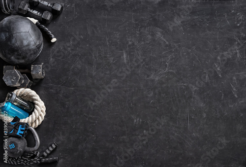 Sports equipment on a black background. Top view. Motivation