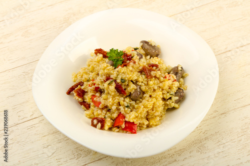 Bulgur with chicken hearts