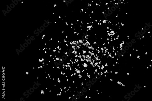 Crumbled styrofoam isolated on black background, top view, clipping path