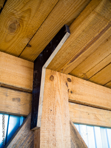 Using a homemade wooden corner when installing a covered transition