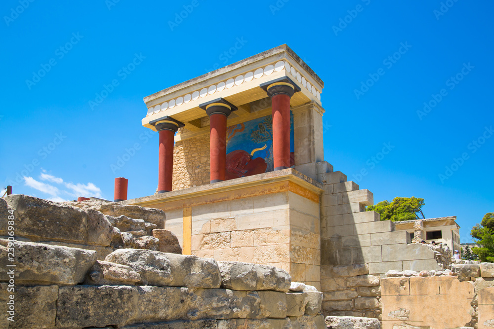 Greece, Crete, Heraklion - July 18, 2018: Knossos ruins, ceremonial and political centre of the tsar Minos. Archaeological site connected with legends of Daedalus, Minotaur, Ariadne and Icarus