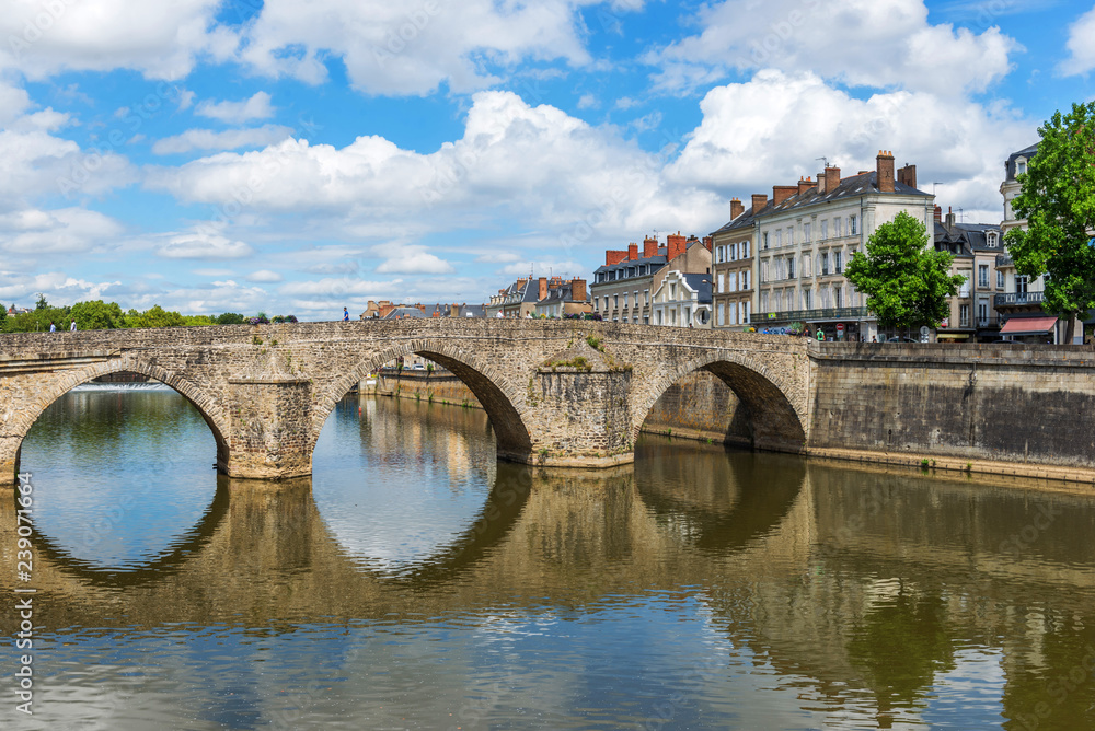 Obraz premium Bridge.Banks of the Mayenne river, City of Laval, Mayenne, Pays de Loire, France. August 5, 2018