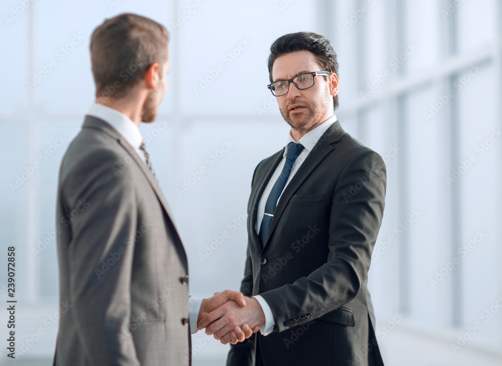 friendly handshake of business partners friendly handshake of business partners