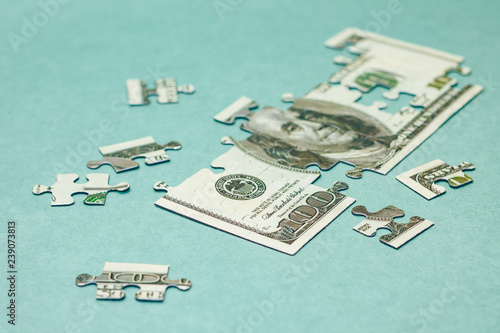 Finance concept. Image of Dollar bill puzzle