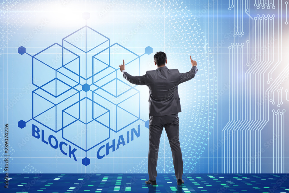 Young businessman in innovative blockchain concept Young businessman in innovative blockchain concept