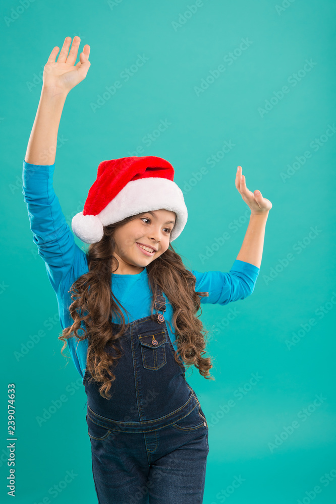Present for Xmas. Childhood. Christmas shopping. New year party. Santa claus kid. Little girl child in santa hat. Happy winter holidays. Small girl. Bright memories. Come Santa Clause and don t delay Present for Xmas. Childhood. Christmas shopping. New year party. Santa claus kid. Little girl child in santa hat. Happy winter holidays. Small girl. Bright memories. Come Santa Clause and don t delay