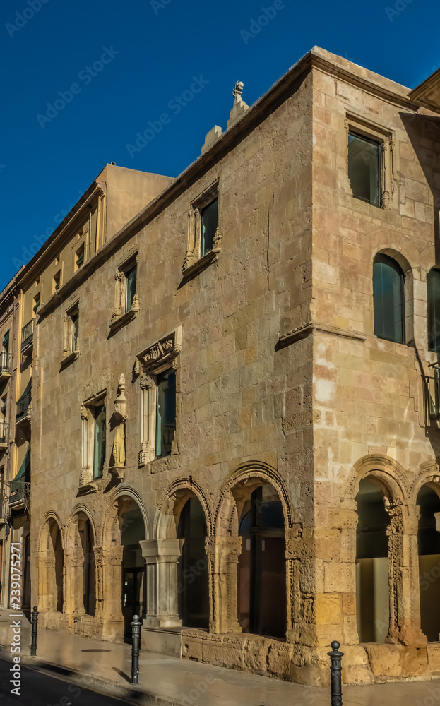 Building next to the Cathedral of Tarragona, Catalonia, Spain. Built on the site of a Roman temple