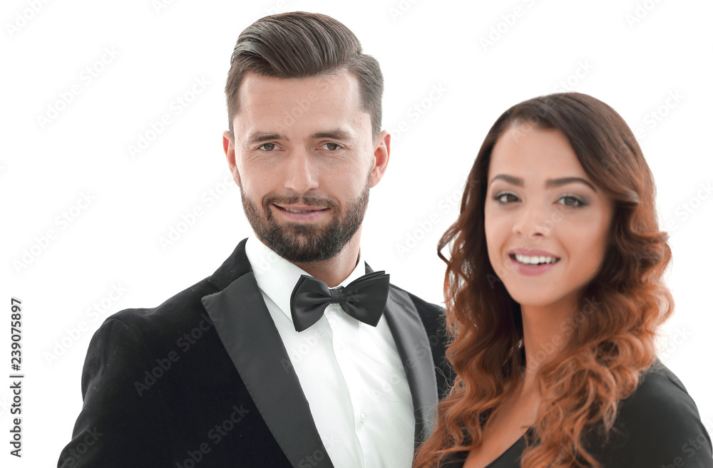 Portrait of a handsome man looking at the camera with a woman Portrait of a handsome man looking at the camera with a woman