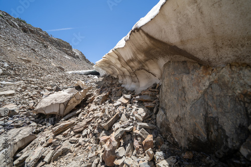 Remaining snow cave along the trail of the 20 Lakes Basin hike in California