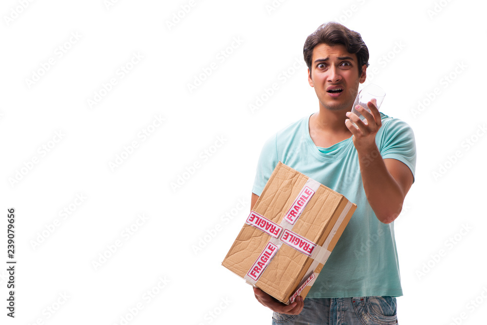 Young handsome man with fragile box ordered from Internet Young handsome man with fragile box ordered from Internet