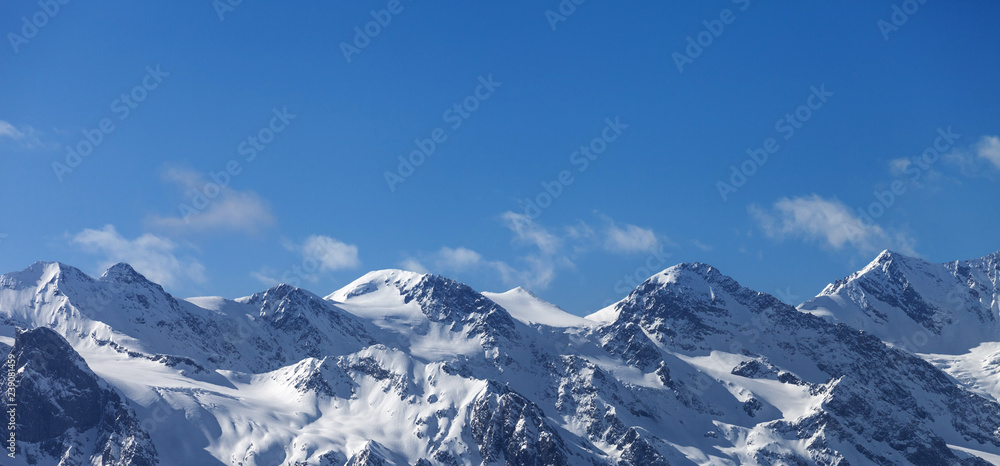 Panoramic view on snowy mountains and glacier in nice sunny evening