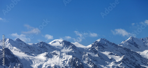 Panoramic view on snowy mountains and glacier in nice sunny evening © BSANI
