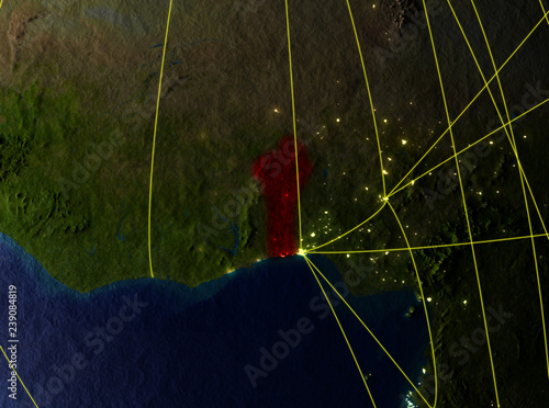 Benin from space on model of planet Earth with networks. Detailed planet surface with city lights.