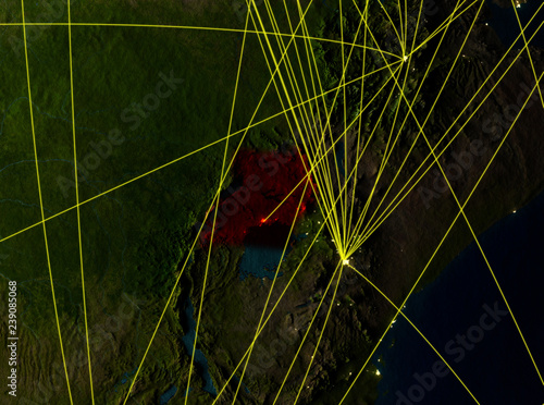 Uganda from space on model of planet Earth with networks. Detailed planet surface with city lights.