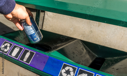 Slika na platnu Emoty can of soda being thrown at the recycling.
