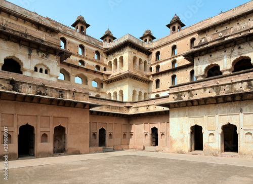 Jahangir Mahal in Orcha, India, is a three storied structure that is marked by stylishly hanging balconies, porches, and apartments.