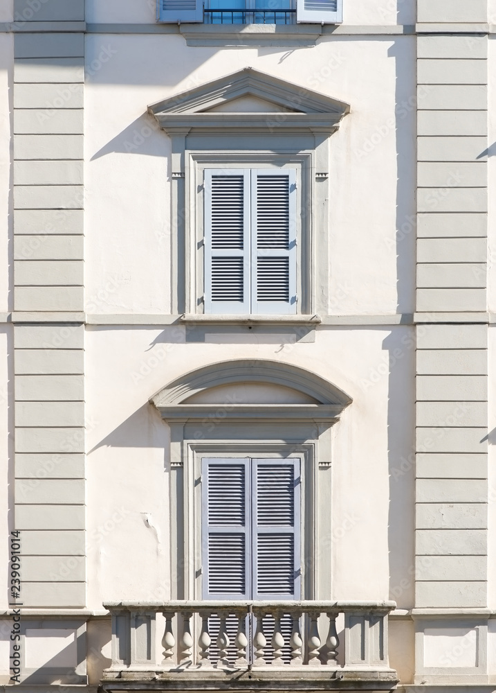 Traditional windows with shutters from Italy and balcony