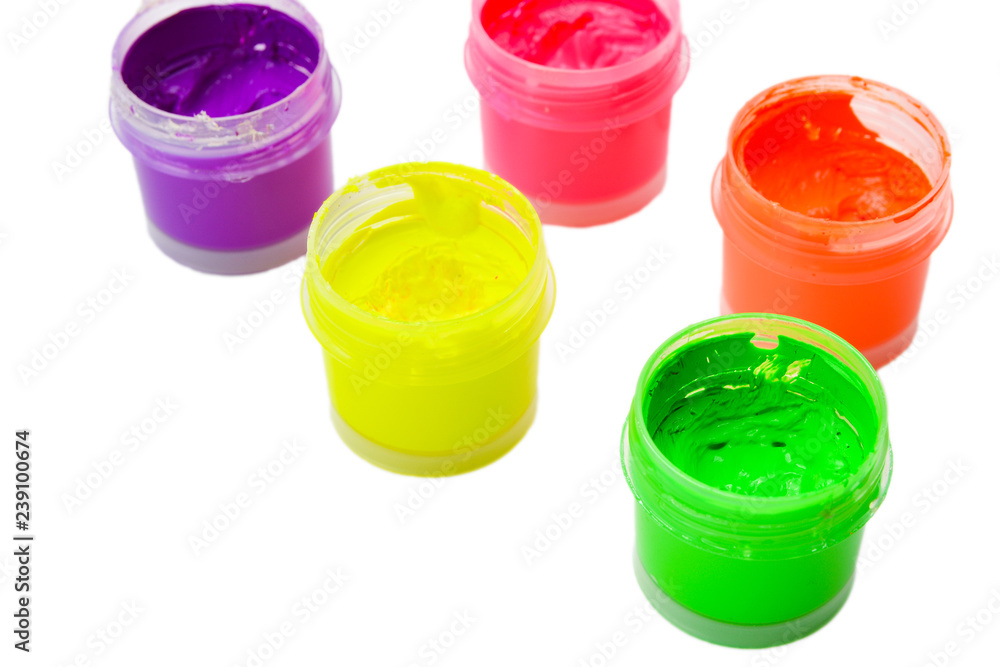 Cans with colorful gouache paint on isolated background Cans with colorful gouache paint on isolated background