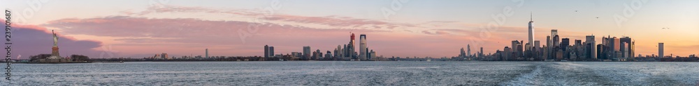View of The Statue of Liberty, Downtown New Jersey and Downtown Manhattan During Early Cold Winter Morning