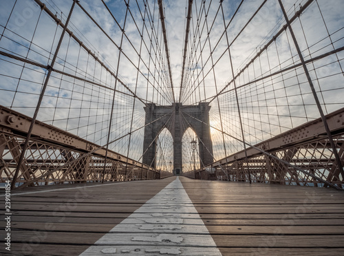 A Low Angle View of the Brooklyn Bridge Upper Walking Deck During Sunrise