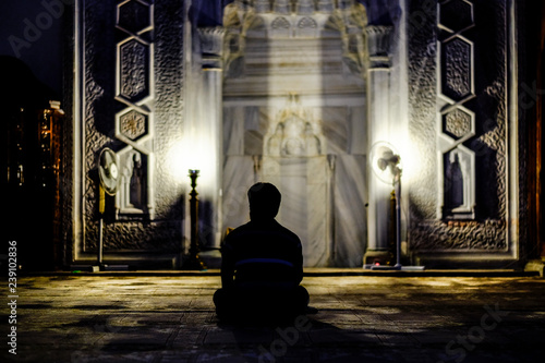 Man praying in mosque