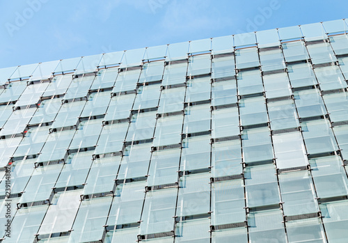 Abstract closeup on office Glass building. Urban or business building concept