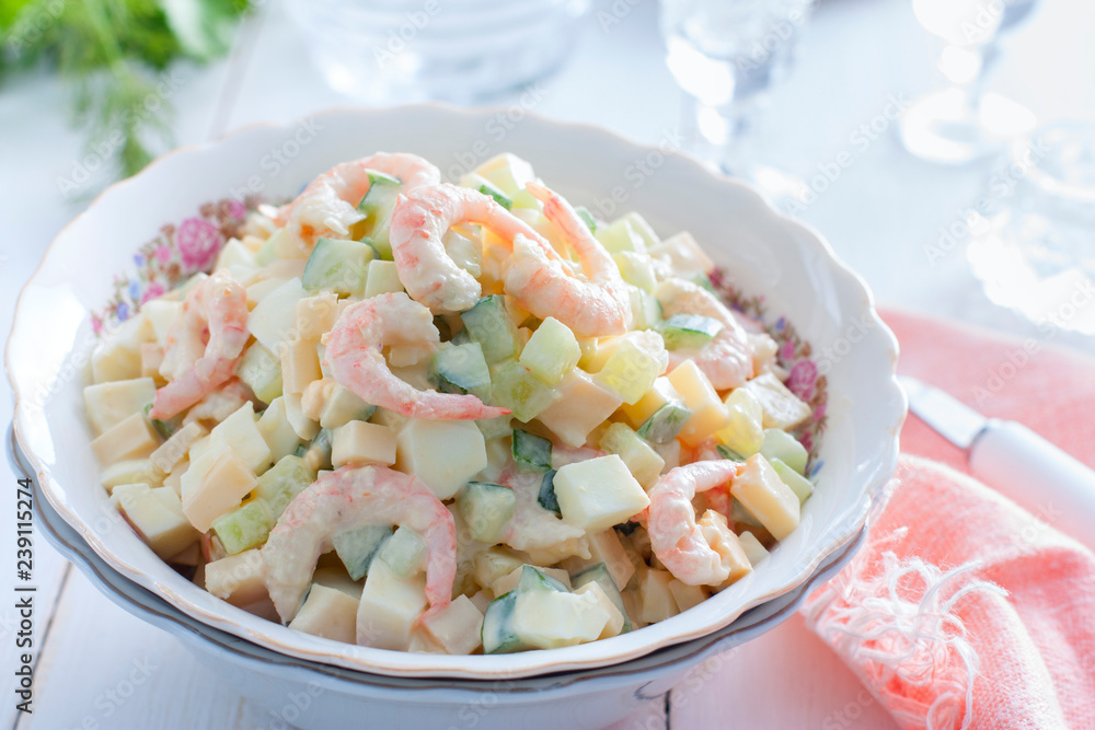 Salad with shrimps, cucumber, eggs and cheese, horizontal Salad with shrimps, cucumber, eggs and cheese, horizontal