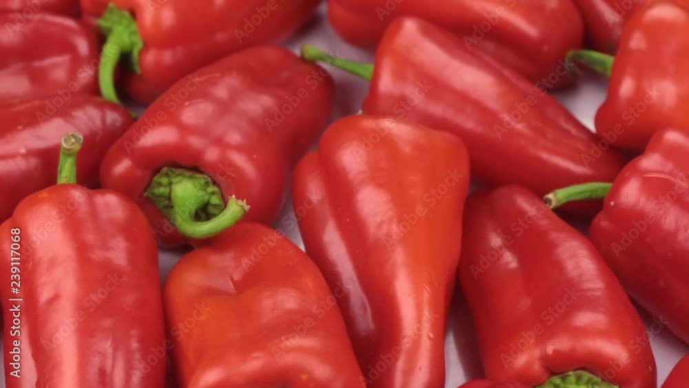 Close-up. The rotation of the background made from peppers. Close-up. The rotation of the background made from peppers.