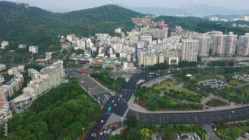 evening time hainan island dadunhai town traffic roads aerial panorama 4k china
 photo