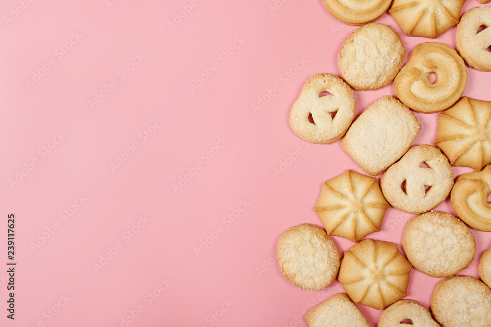 Danish butter cookies on pink background with space for your text. Danish butter cookies on pink background with space for your text.
