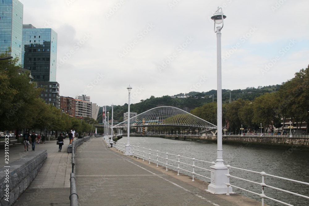 Fototapeta premium The Zubizuri bridge and embankment in Bilbao