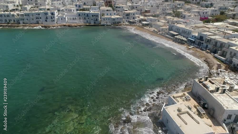 Aerial view of Naousa city, with traditional white houses, Greece. Aerial view of Naousa city, with traditional white houses, Greece.