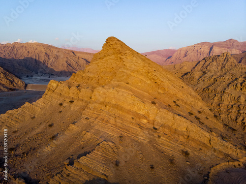 Sandstone desert rock scenery at dusk