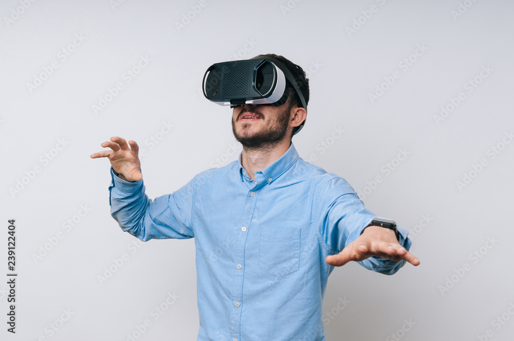 Photo of man using a virtual reality glasses for the first time Photo of man using a virtual reality glasses for the first time