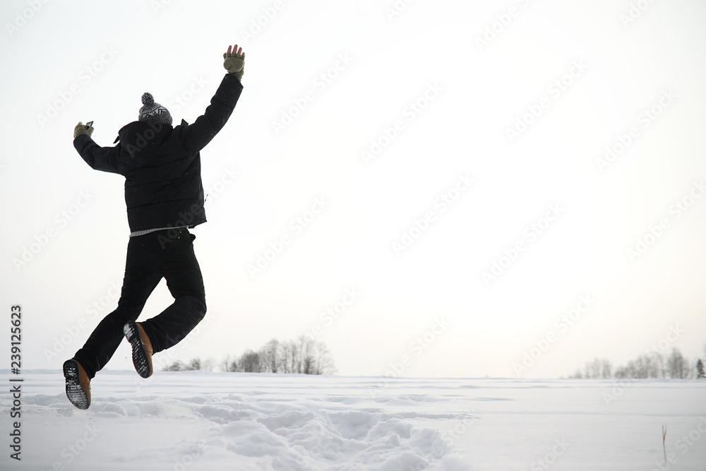 A man on a walk. Winter landscape. Tourist in winter journey. A man on a walk. Winter landscape. Tourist in winter journey.