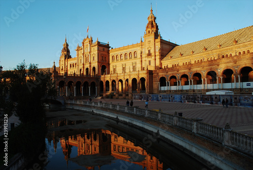a beautiful sunset in Seville, reflected in the canal