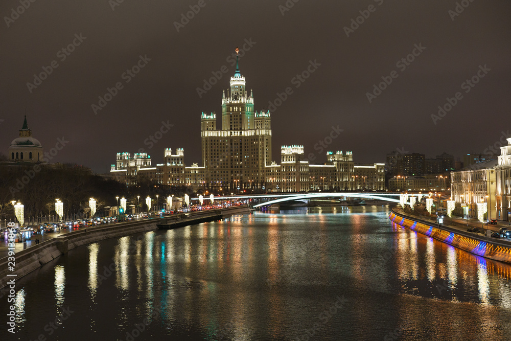 Bright Moskva-river embankment at the winter night