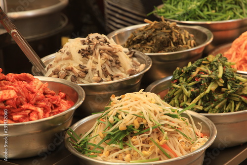 Korean Street Food inside Gwangjang Market in Seoul, South Korea photo