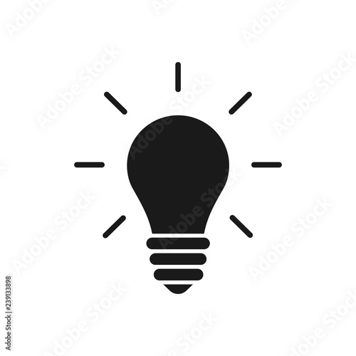 Black isolated icon of light bulb on white background. Silhouette of illuminated lamp. Symbol of idea, creative. Flat design.