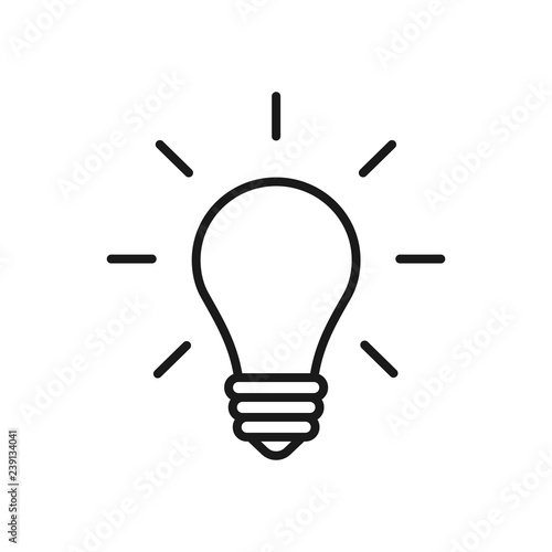 Black isolated outline icon of light bulb on white background. Line Icon illuminated lamp. Symbol of idea, creative. photo