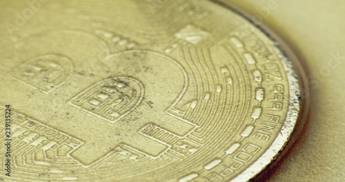 Crypto currency Gold Bitcoin - BTC - Bit Coin in gold paints. Macro.