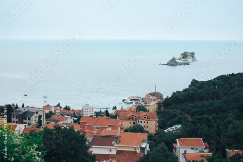 iled roofs and two islands in the Adriatic Ocean, Montenegro photo