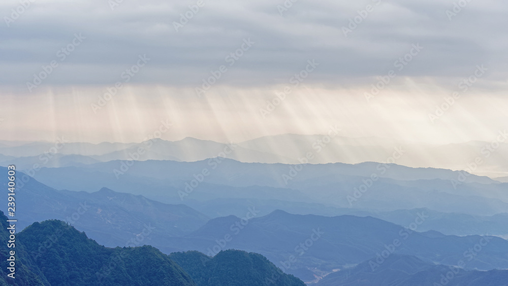 The sun shining down from heaven on the mountain. Wugong Mountain, Jiangxi, China.